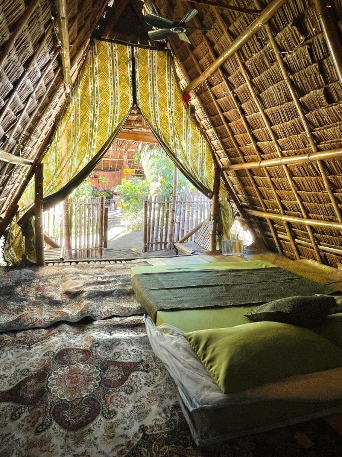 Хостел Tribal Huts Community Daanbantayan Экстерьер фото