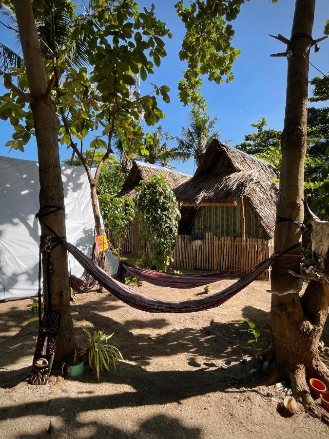Хостел Tribal Huts Community Daanbantayan Экстерьер фото
