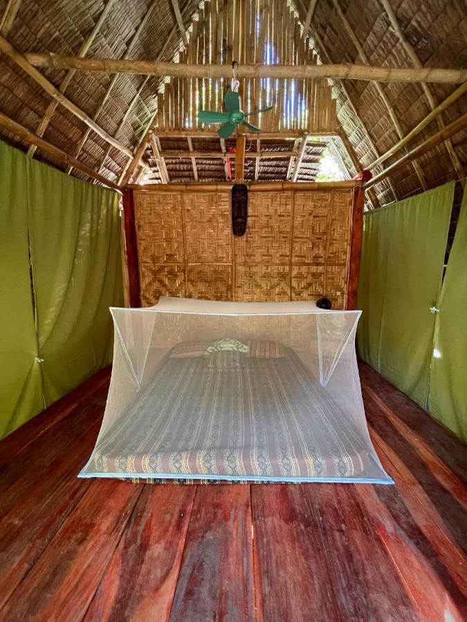Хостел Tribal Huts Community Daanbantayan Экстерьер фото