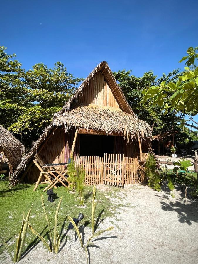 Хостел Tribal Huts Community Daanbantayan Экстерьер фото