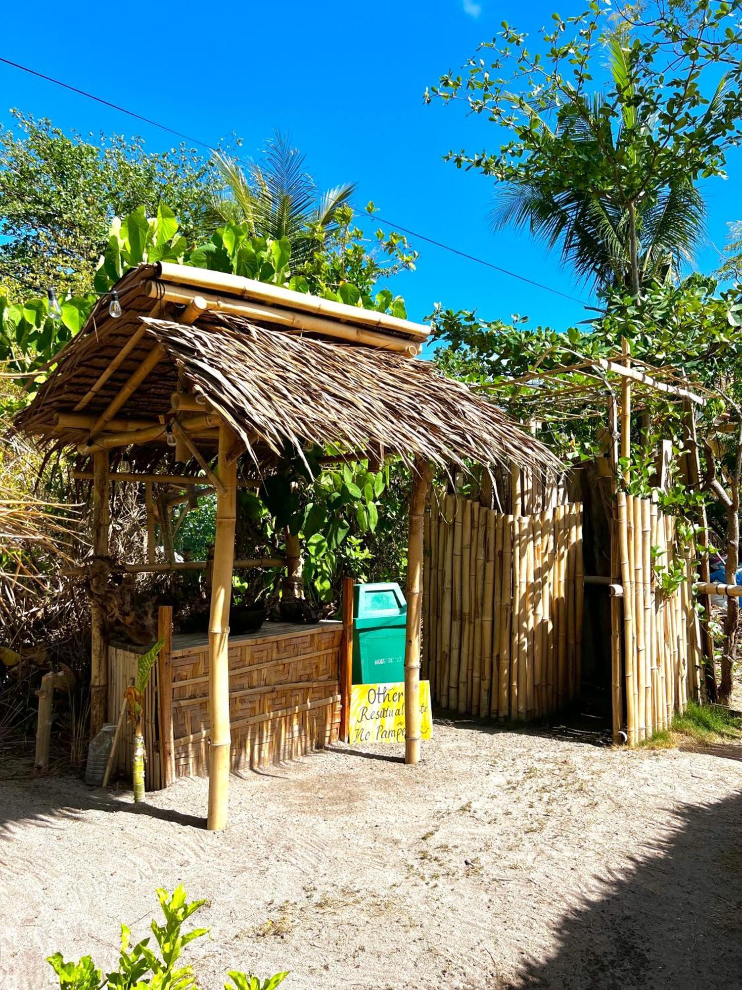 Хостел Tribal Huts Community Daanbantayan Экстерьер фото